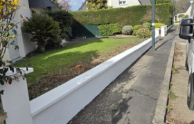 Rénovation d'un mur extraire pose de tablette béton réparation des fissures mise en peinture de couche